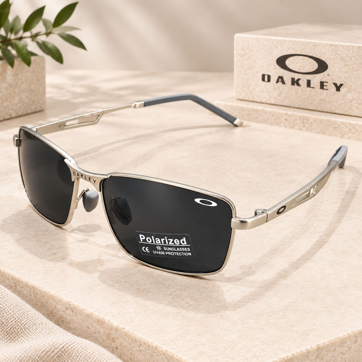 عینک آفتابی زنانه و مردانه Oakley با فریم فلزی و لنز دودی